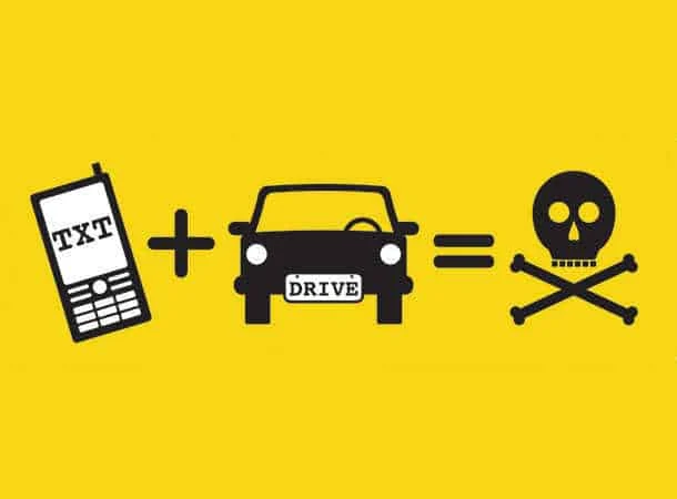 Make the glove box the phone box or risk a £200 fine